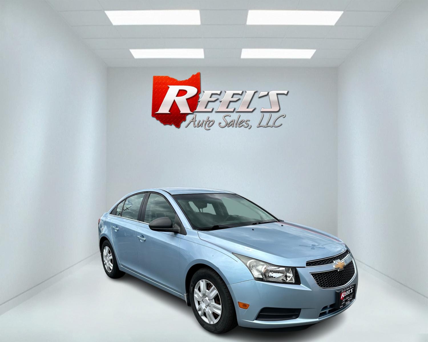 2011 Blue /Black Chevrolet Cruze LS Auto (1G1PC5SHXB7) with an 1.8L I4 DOHC 16V engine, 6-Speed Automatic transmission, located at 547 E. Main St., Orwell, OH, 44076, (440) 437-5893, 41.535435, -80.847855 - Photo #2